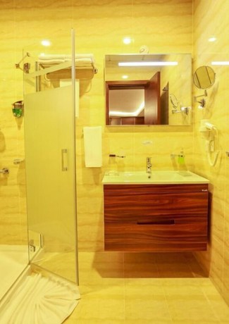 Imagen de la habitación del Hotel Oyyo Plaza Apartment. Foto 9