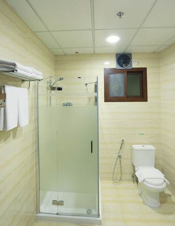 Imagen de la habitación del Hotel Oyyo Plaza Apartment. Foto 11