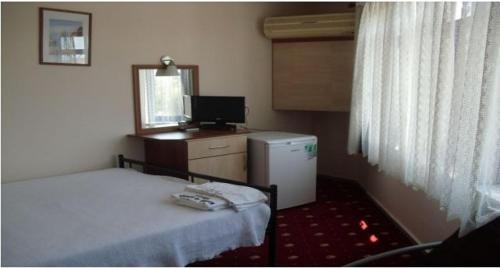 Imagen de la habitación del Hotel Ozalp Han. Foto 10