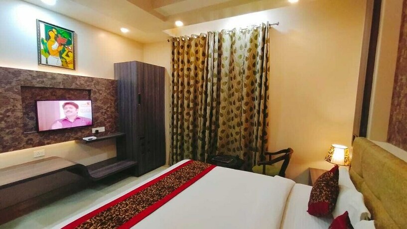 Imagen de la habitación del Hotel Ozas Grand. Foto 20