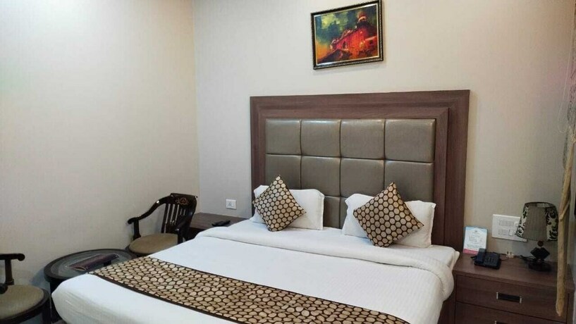 Imagen de la habitación del Hotel Ozas Grand. Foto 22