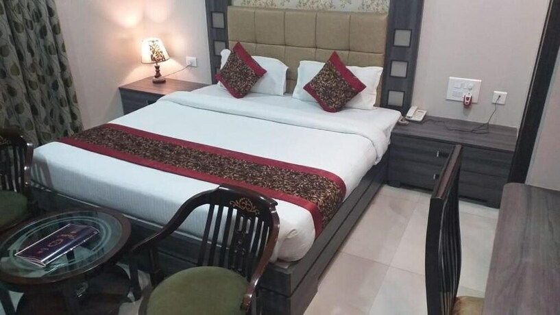 Imagen de la habitación del Hotel Ozas Grand. Foto 26