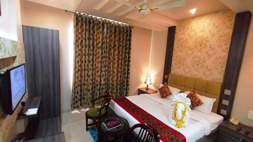 Imagen de la habitación del Hotel Ozas Grand. Foto 27