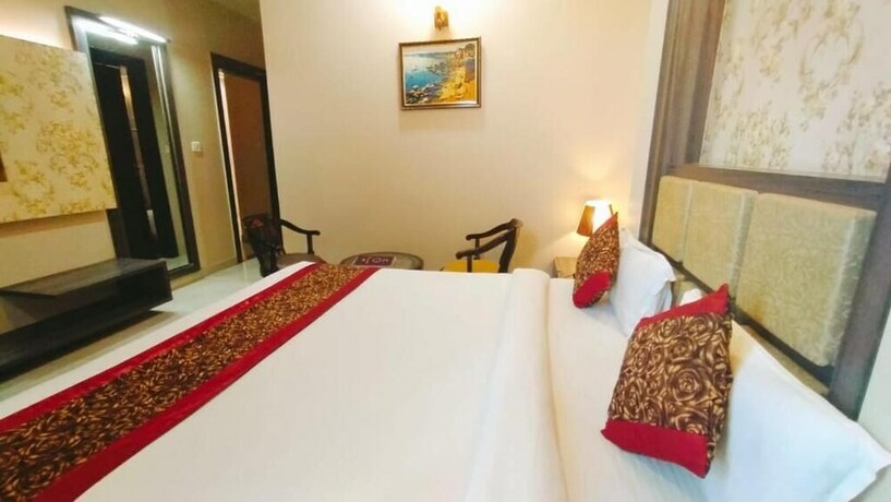 Imagen de la habitación del Hotel Ozas Grand. Foto 31