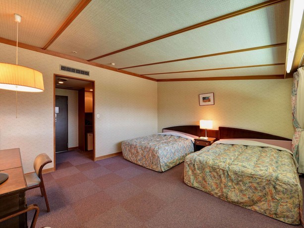 Imagen de la habitación del Hotel Oze Iwakura Resort. Foto 10