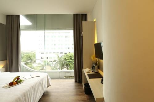 Imagen de la habitación del Hotel Ozone Pantai Indah Kapuk. Foto 2