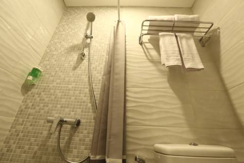 Imagen de la habitación del Hotel Ozone Pantai Indah Kapuk. Foto 4