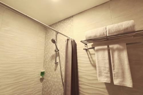 Imagen de la habitación del Hotel Ozone Pantai Indah Kapuk. Foto 6