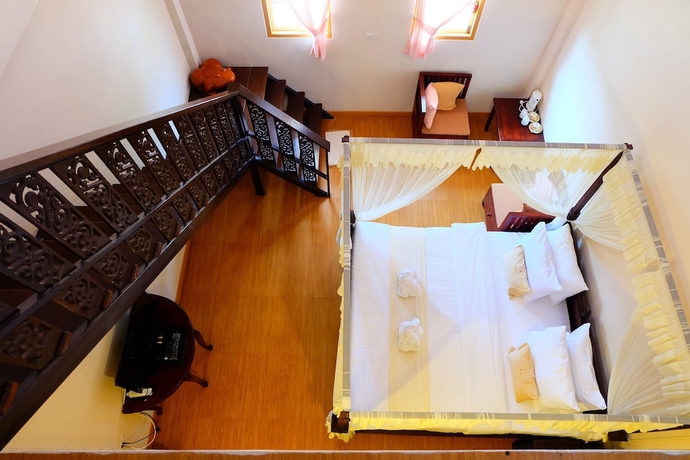 Imagen de la habitación del Hotel P Paradise. Foto 11