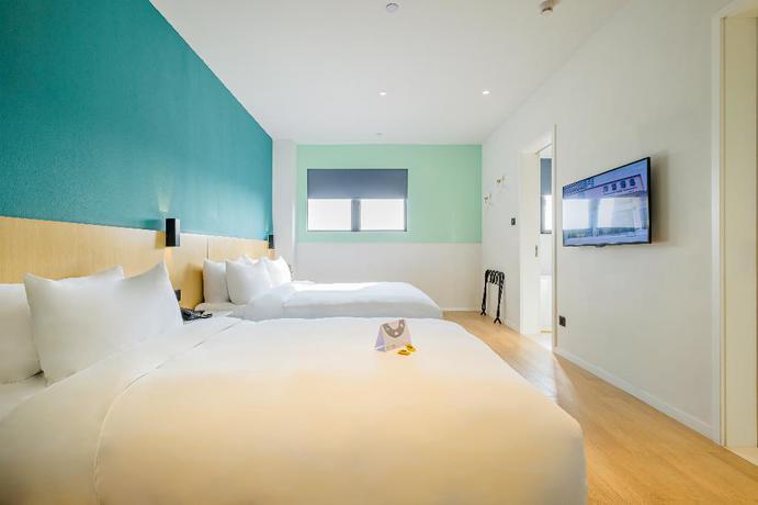 Imagen de la habitación del Hotel PACE HOTEL Suzhou Renmin Road. Foto 11