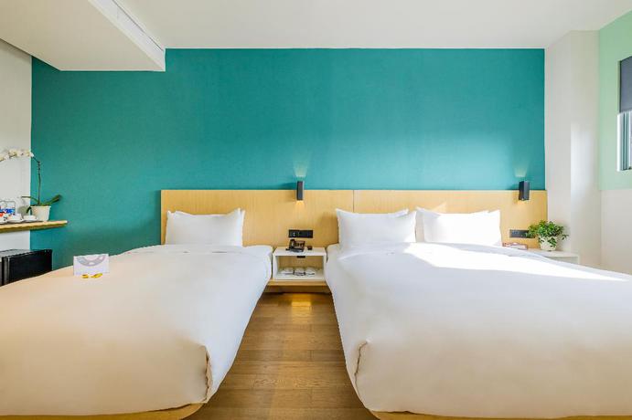 Imagen de la habitación del Hotel PACE HOTEL Suzhou Renmin Road. Foto 12
