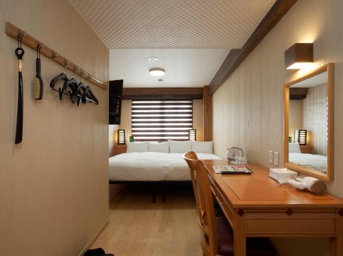 Imagen de la habitación del Hotel PACIFICO Hotel and Spa. Foto 8