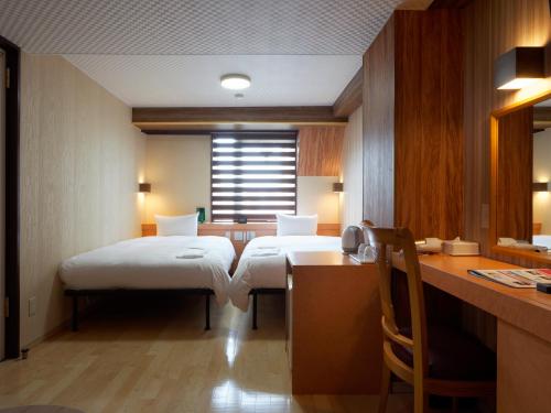 Imagen de la habitación del Hotel PACIFICO Hotel and Spa. Foto 10