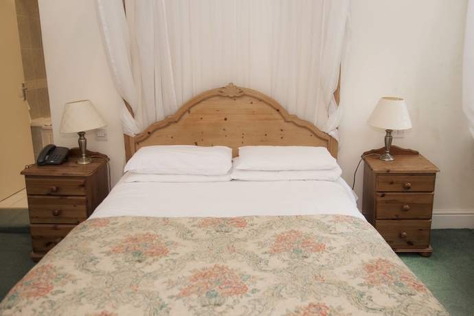 Imagen de la habitación del Hotel PADDINGTON HOUSE. Foto 7
