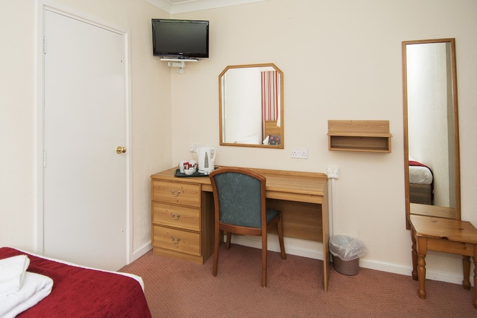 Imagen de la habitación del Hotel PADDINGTON HOUSE. Foto 11
