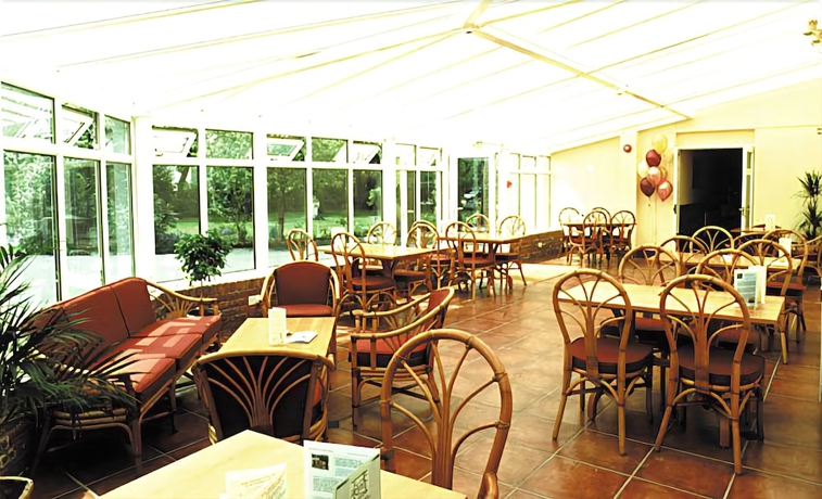 Imagen del bar/restaurante del Hotel PADDINGTON HOUSE. Foto 2