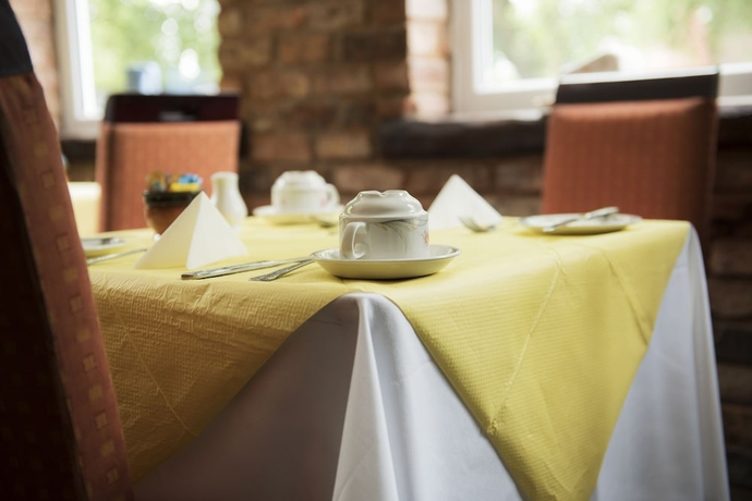 Imagen del bar/restaurante del Hotel PADDINGTON HOUSE. Foto 4