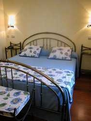 Imagen de la habitación del Hotel PALACETE REAL. Foto 10