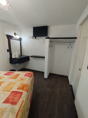 Imagen de la habitación del Hotel PALACIO DE LOS ANGELES. Foto 12