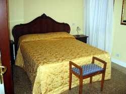 Imagen de la habitación del Hotel PALAZZO ROSA. Foto 3