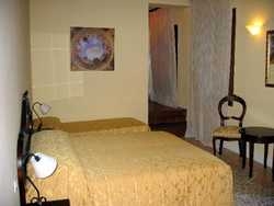 Imagen de la habitación del Hotel PALAZZO ROSA. Foto 5