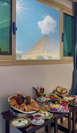 Imagen de la habitación del Hotel PANORAMA view pyramids. Foto 16