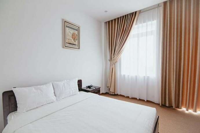 Imagen de la habitación del Hotel PAPA DONG HOI HOTEL. Foto 9