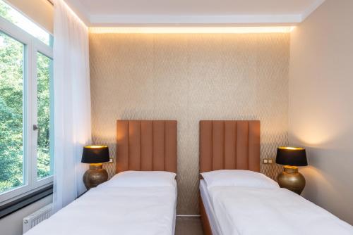 Imagen de la habitación del Hotel PAPPAS hotel&studio. Foto 19
