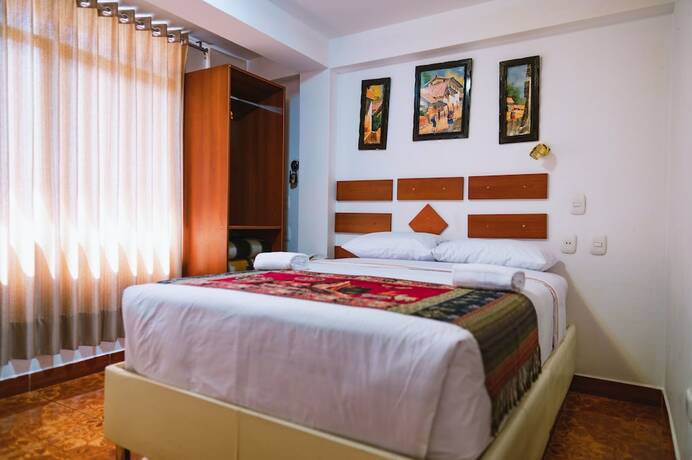 Imagen de la habitación del Hotel PAQARIQ INN HOTEL. Foto 6