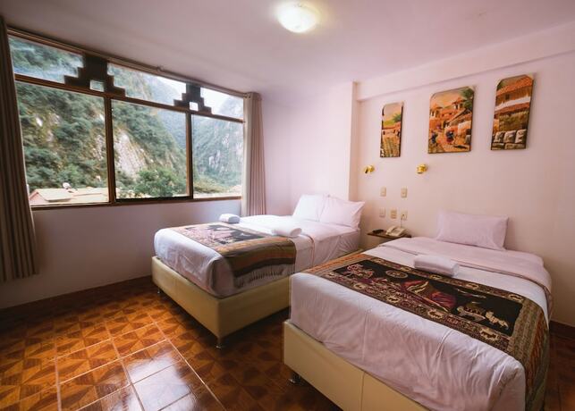 Imagen de la habitación del Hotel PAQARIQ INN HOTEL. Foto 7