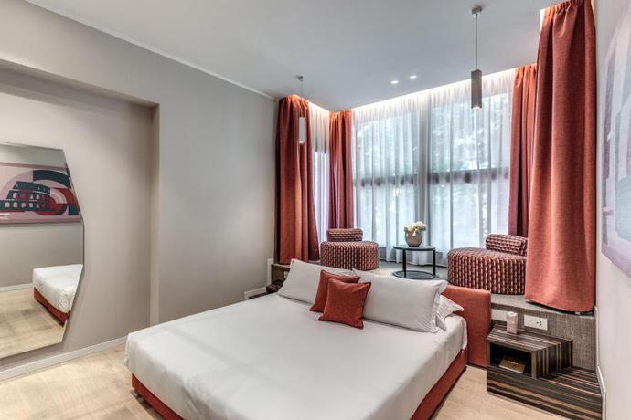 Imagen de la habitación del Hotel PARIOLI CUBE HOTEL. Foto 8