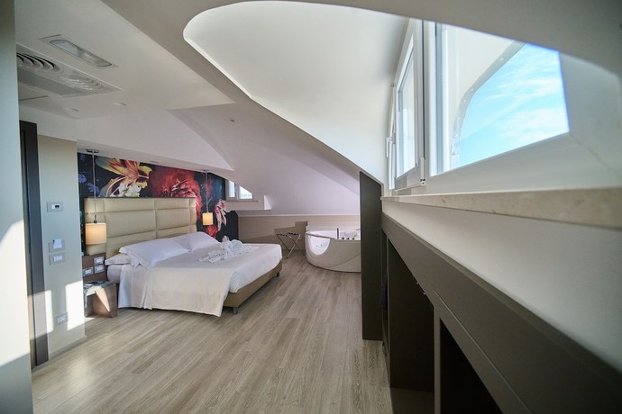 Imagen de la habitación del Hotel PARK HOTEL LE DUNE DI GIOVINO. Foto 9