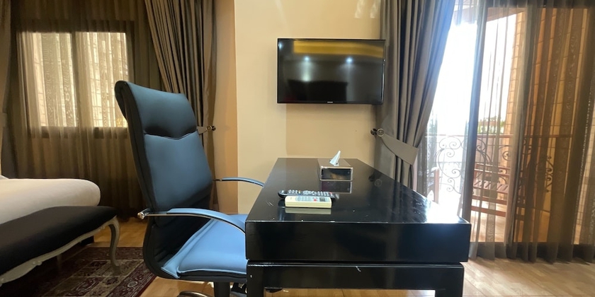 Imagen de la habitación del Hotel PARTICULAR DESTINY SUITES, Douala. Foto 5
