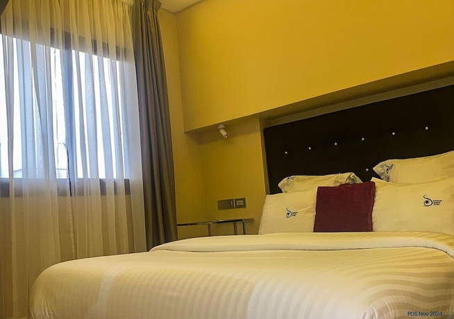 Imagen de la habitación del Hotel PARTICULAR DESTINY SUITES, Douala. Foto 8