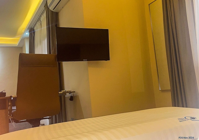 Imagen de la habitación del Hotel PARTICULAR DESTINY SUITES, Douala. Foto 9