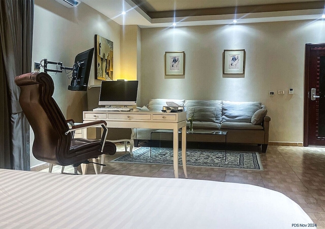 Imagen de la habitación del Hotel PARTICULAR DESTINY SUITES, Douala. Foto 13