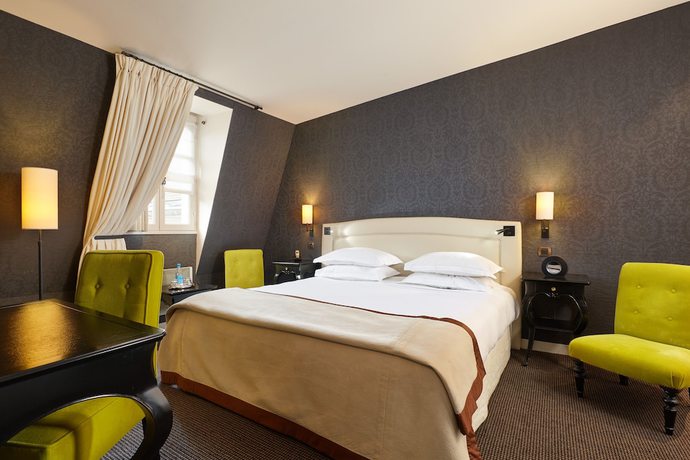 Imagen de la habitación del Hotel PAVILLON DE LA REINE. Foto 3