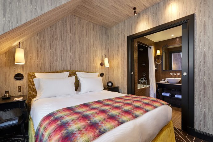 Imagen de la habitación del Hotel PAVILLON DE LA REINE. Foto 11