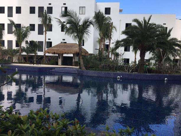 Imagen de la piscina del Hotel PAXTON VACANCES HOTEL SUITE SANYA. Foto 5