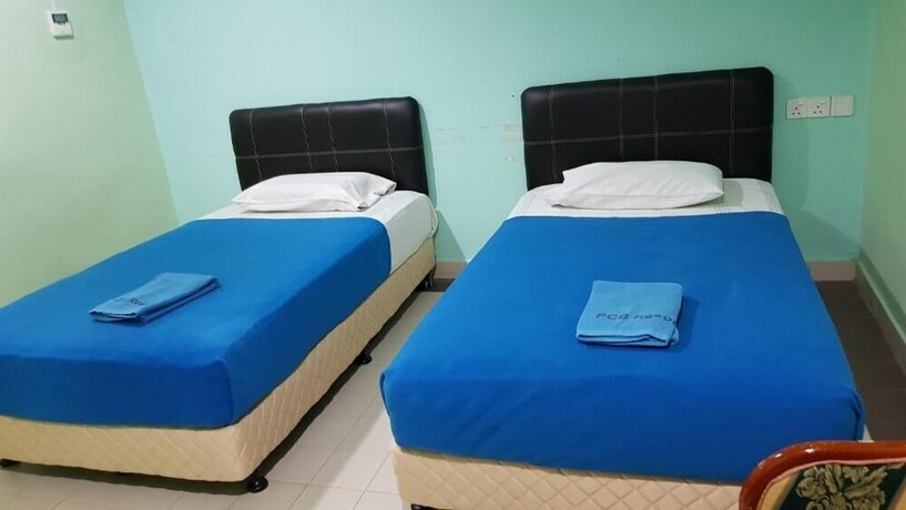 Imagen de la habitación del Hotel PCB Beach Resort. Foto 32