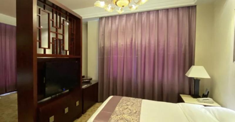 Imagen de la habitación del Hotel PEACE HOTEL LANZHOU. Foto 4