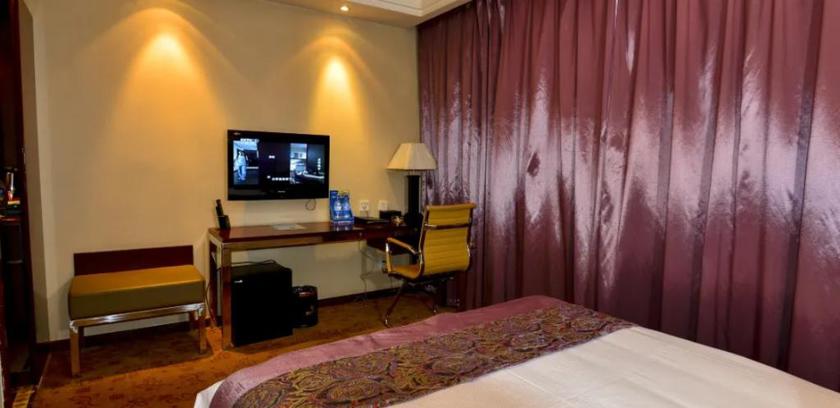 Imagen de la habitación del Hotel PEACE HOTEL LANZHOU. Foto 6