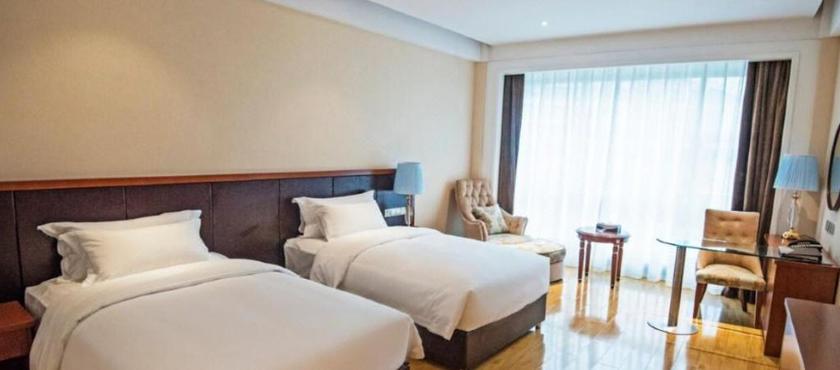 Imagen de la habitación del Hotel PEACH BLOSSOM ISLAND HOTEL. Foto 12