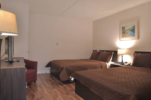 Imagen de la habitación del Hotel PENINSULA INN & RESORT - STANDARD (1 OR 2 BEDS). Foto 10