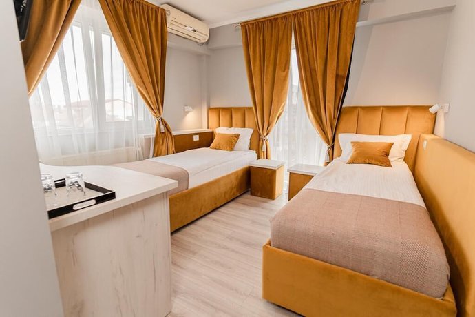Imagen de la habitación del Hotel PENSIUNEA ELISEI. Foto 7