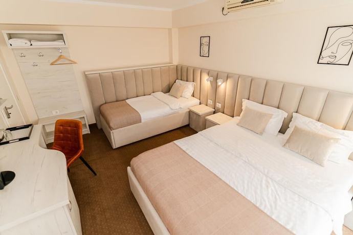 Imagen de la habitación del Hotel PENSIUNEA ELISEI. Foto 9