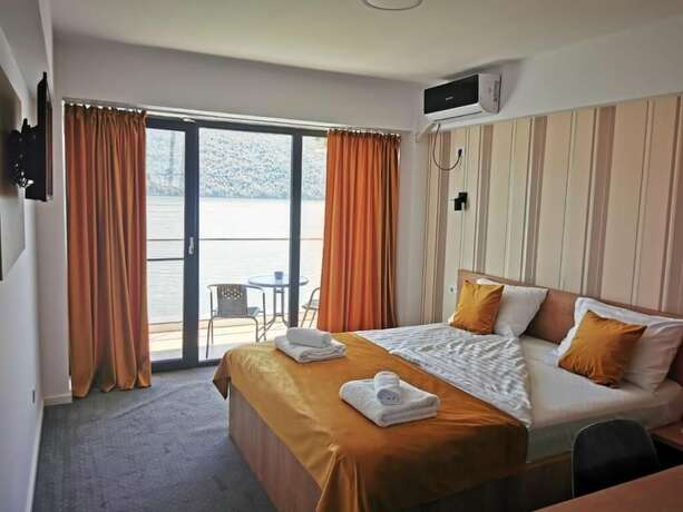 Imagen de la habitación del Hotel PENSIUNEA SUNSHINE. Foto 19