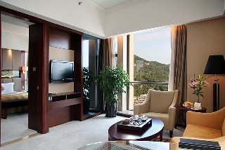 Imagen de la habitación del Hotel PEONY INTERNATIONAL. Foto 15
