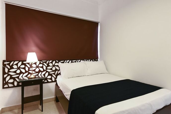 Imagen de la habitación del Hotel PH 19 Guesthouse. Foto 11