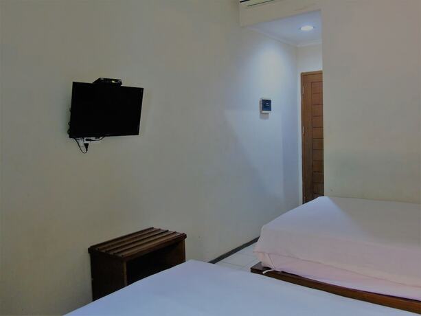 Imagen de la habitación del Hotel PIA Cirebon. Foto 15
